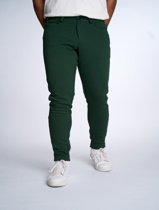 Person wearing Dapper Boi slim casual knit pants in green, front view